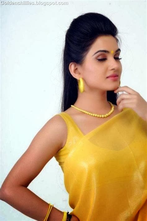 Actress HOT Photos HOT Actress Kavya Singh Spicy Stills In Yellow