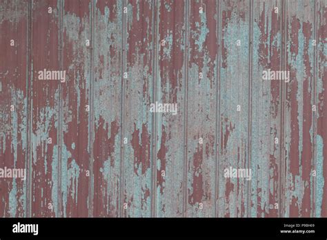 Faded Peeling Rusty Steel Sheets With Oxblood Red Paint Grunge