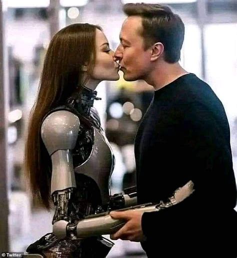 Bizarre Photo Of Elon Musk Kissing A Robot Leaves The Internet Baffled