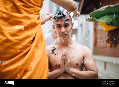 Close Up Image Of A Handsome Asian Man Is Shaving Hair By Head Of Man