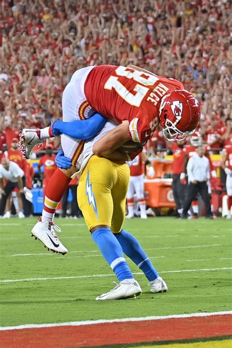Derwin James Small Bodyslammed Travis Kelce Large In The Biggest