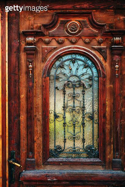 Old Vintage Wooden Door With Carving Decoration And Wrought Iron