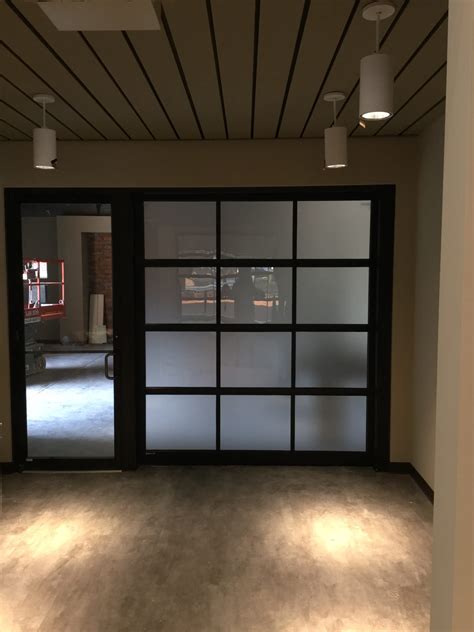 Glass Overhead Doors Installed In Office Norcross GA | Frosted Glass