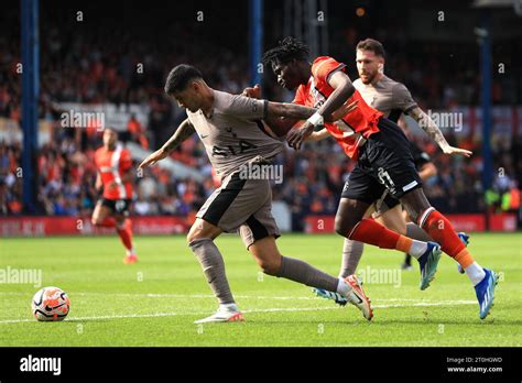 Tottenham Hotspur S Cristian Romero Left And Luton Town S Elijah