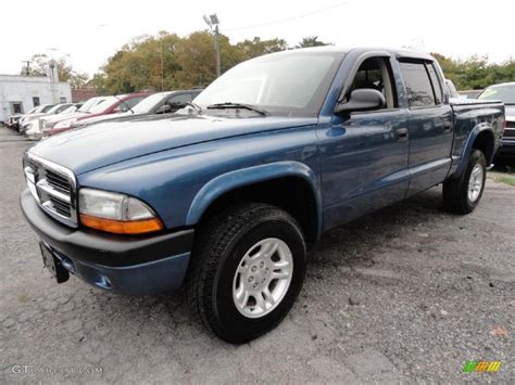 2004 Atlantic Blue Pearl Dodge Dakota Sport Quad Cab 4x4 38475259 Photo 11