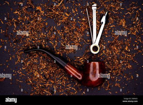 Pipe and pipe smoking accessories Stock Photo - Alamy