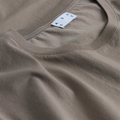 A New Color For The Lightweight T Shirt Is It Grayish Brown Or Brownish Gray This Color Owes