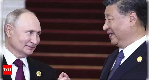 China S Xi Russia S Putin Hold Talks In Beijing Times Of India