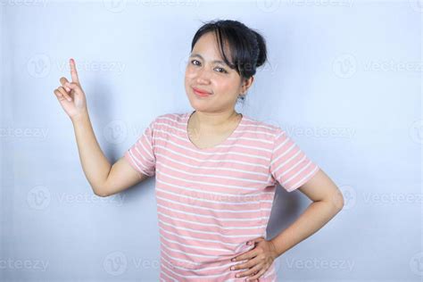 Portrait Asian Beautiful Young Woman Smiling Standing Pointing Finger Out On White Background