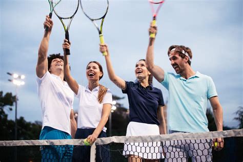 Fit Happy Poeple Playing Tennis Together Sport Concept Stock Image