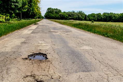 Michigan Pothole Stock Photos Pictures And Royalty Free Images Istock