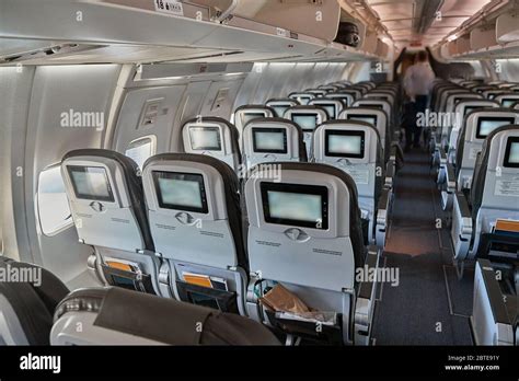 Plane cabin interior Stock Photo - Alamy