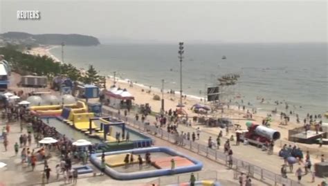 Millions Of Bikini Clad Revellers Get Down And Dirty At Bizarre Mud Festival World News