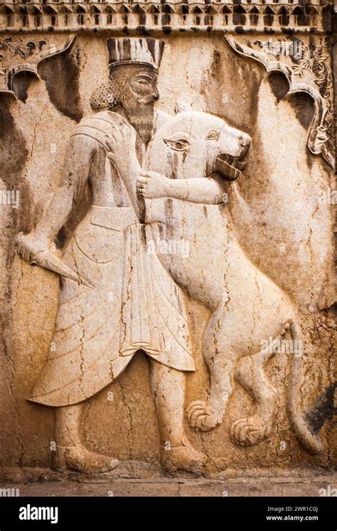 Ancient Bas Relief In Persepolis Iran Man Is Killing A Lion Stock