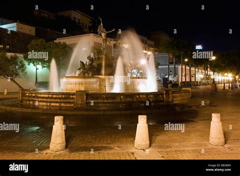 Illuminated Fountain on Paseo De La Princesa Old San Juan Puerto Rico Stock Photo - Alamy