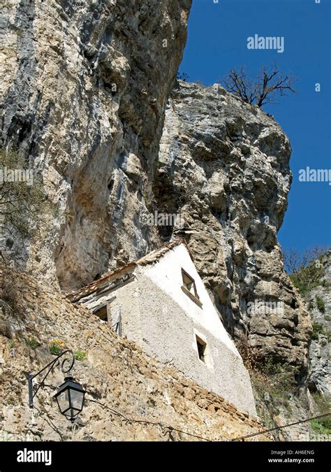 House Built On Walls Of Steep Rocks In Gluges Valley Of Dordogne Lot