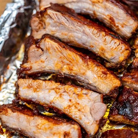 Tender Oven Baked Bbq Ribs That Fall Off The Bone Scrambled Chefs