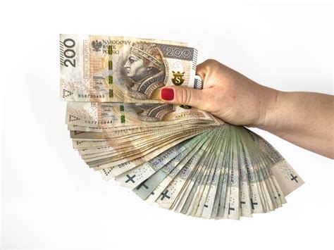 Stack Of Polish Zloty Zl Pln Paper Bills In Female Hands Isolated On