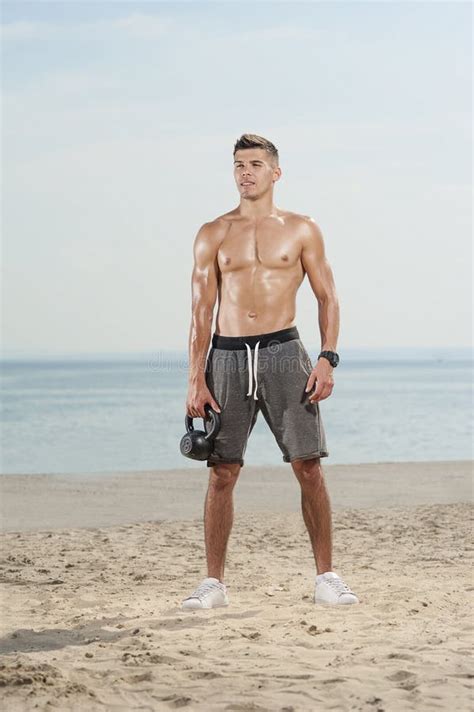 Man With A Naked Body Doing Kettlebell Exercise Stock Photo Image Of