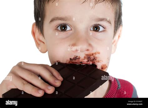 Smiling Kid Eating Chocolate Smeared Stained With Chocolate Lips