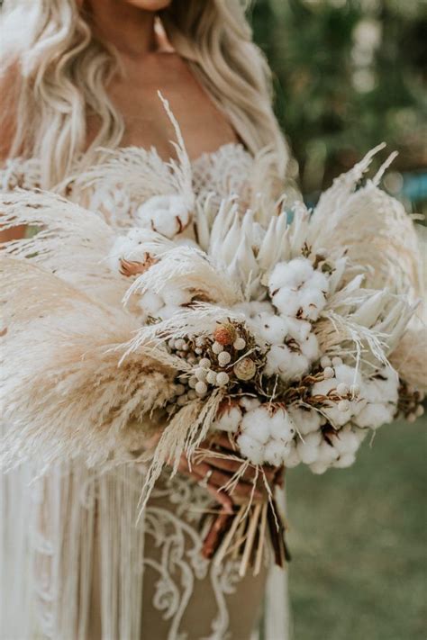 The Wedding Bouquet Was Done With Berries Cotton King Proteas And