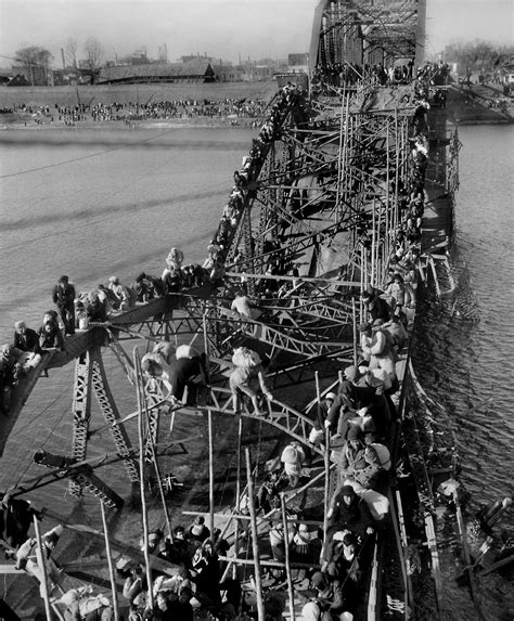 Escaping over the Taedong Bridge | The Famous Pictures Collection