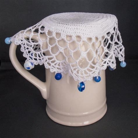 White Crochet Beaded Jug Cover With Blue Glass Beads Beaded