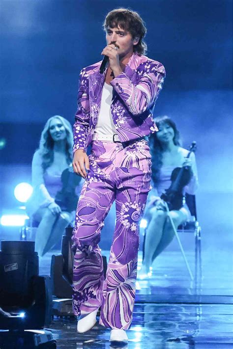 Benson Boone Rocks Bold Purple Patterned Suit for His 'Mystical Magical