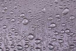 Texture Of Gray Metal With Drops Of Water