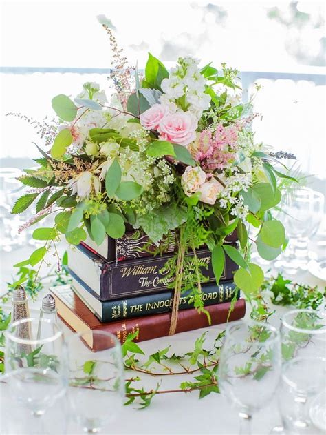 14 Creative Ways To Use Books As Wedding Décor Themed Wedding Decorations Book Wedding