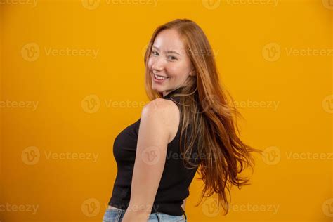 Portrait Of Beautiful Cheerful Redhead Girl Smiling Laughing Looking At