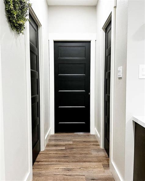 Kitchen With White Cabinets And Stainless Steel Appliances