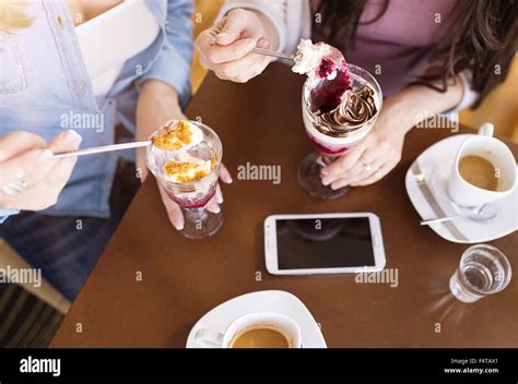 Beautiful Women In Cafe Stock Photo Alamy