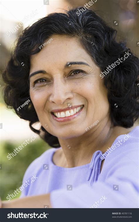 Portrait Smiling Indian Woman Sitting On Stock Photo 40781116