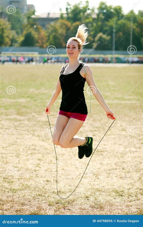 Young Sporty Woman Workout Jumping Over Rope Stock Image Image Of