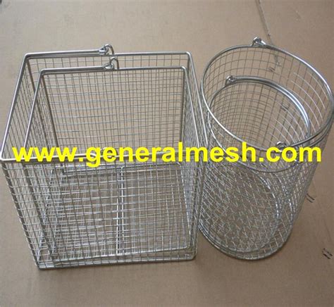 Two Metal Baskets Sitting Next To Each Other