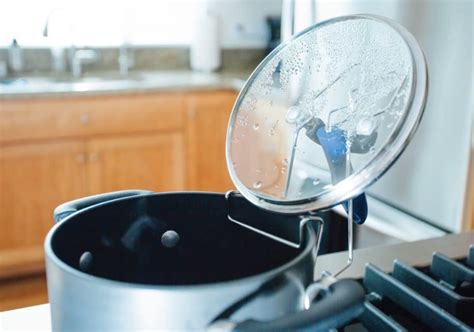 LidSitter Allows You To Hang Pot Lids and Ladles Right On Your Pot