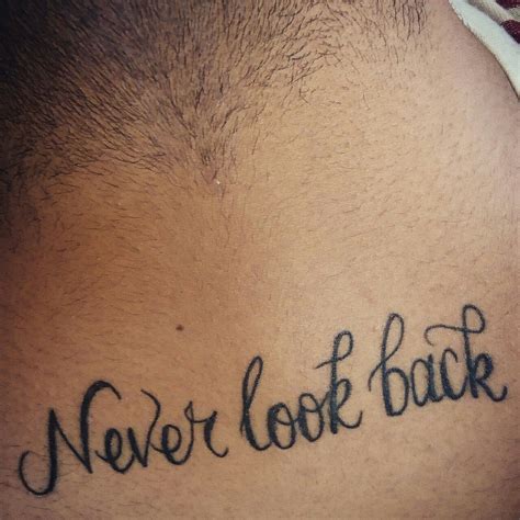 Never look back tattoo | Back tattoos for guys, Back tattoo quotes ...