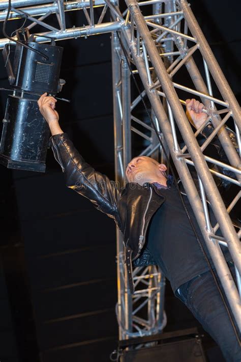 He setting up speakers stock photo. Image of fixing - 275396856