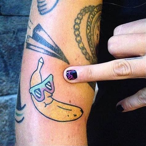 Kawaii Style Banana Tattoo On The Right Upper Arm Tattoo Artist Numi