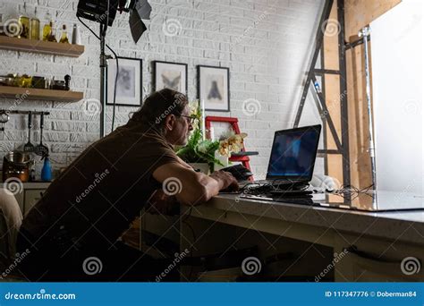 Handsome Man Is Working In Data Centre With Laptop Stock Photo Image