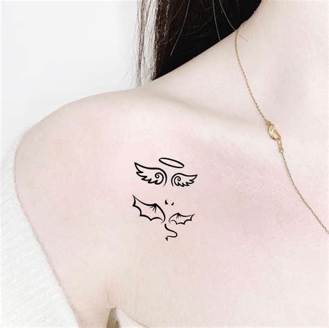 Small Angel Tattoo On Chest