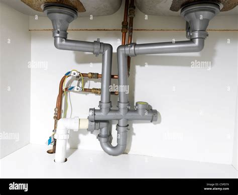 Waste Pipe And Fittings Under A Double Kitchen Sink And Earth Bonding ...