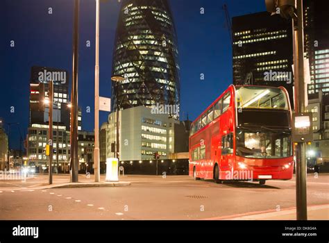 Red Bus in City of London. Night in city of London Stock Photo - Alamy