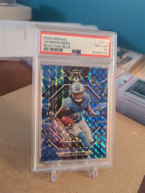 Jahmyr Gibbs 2023 Mosaic 324 Reactive Blue PSA 10 Price Guide Sports