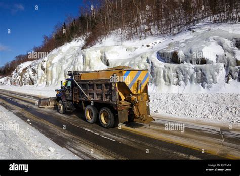 Snow plow truck on Route 112 in Kinsman Notch of Woodstock, New ...