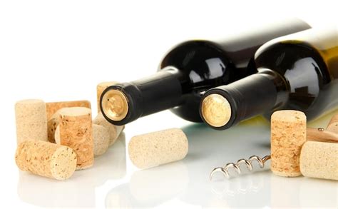 Premium Photo | Wine and corks isolated on white