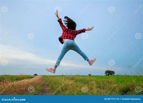 Behind The Scenes Of A Girl Aged 4 To 6 Jumping With Her Arms