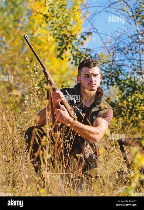 Hunter With Rifle Ready To Hunting Nature Background Hunting Skills