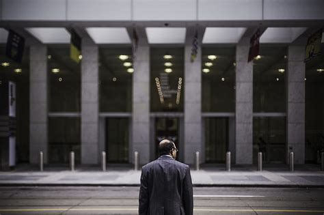 Man Standing In Front Of Building Hd Wallpaper Peakpx